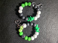 Green Spooky Character Wristlet